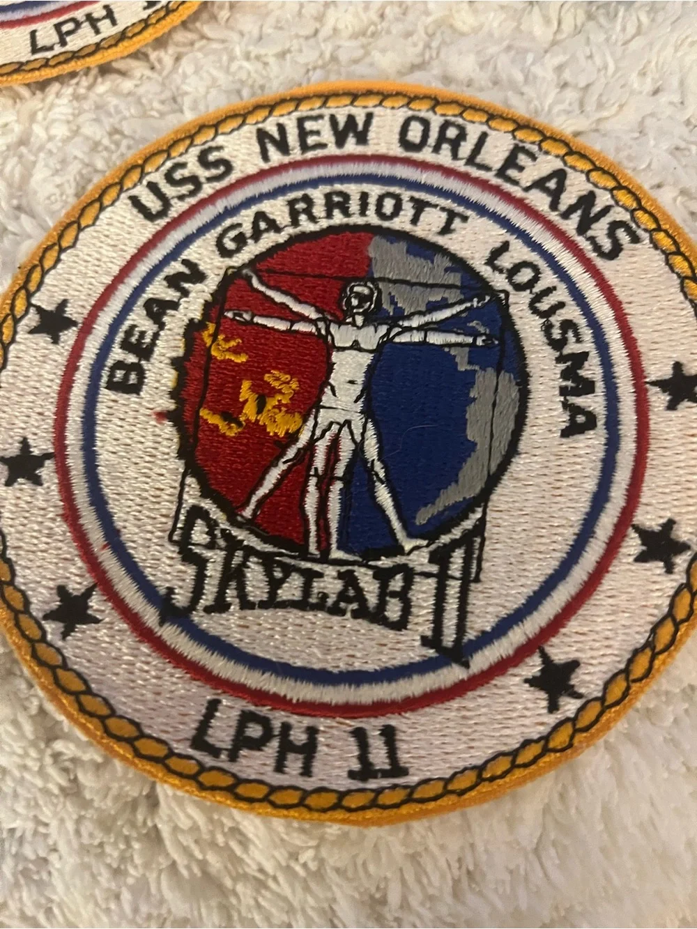 A collection of 4 embroidered NASA mission patches. See description for details.